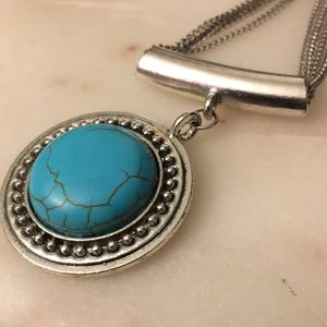 Silver/turquoise necklace w/ earrings.